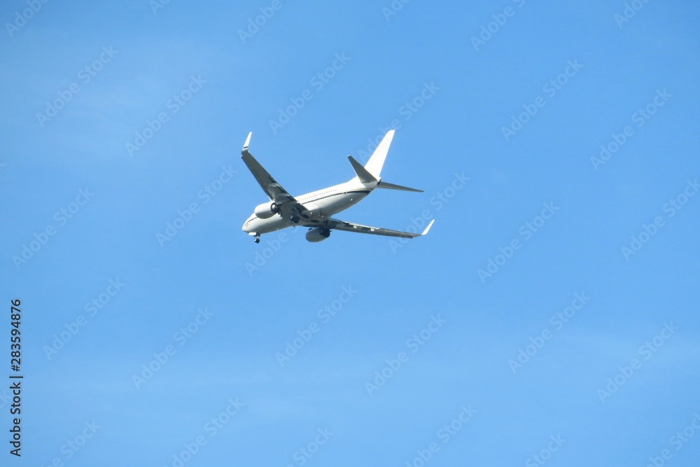 Airplane on blue sky background Airplane on blue sky background