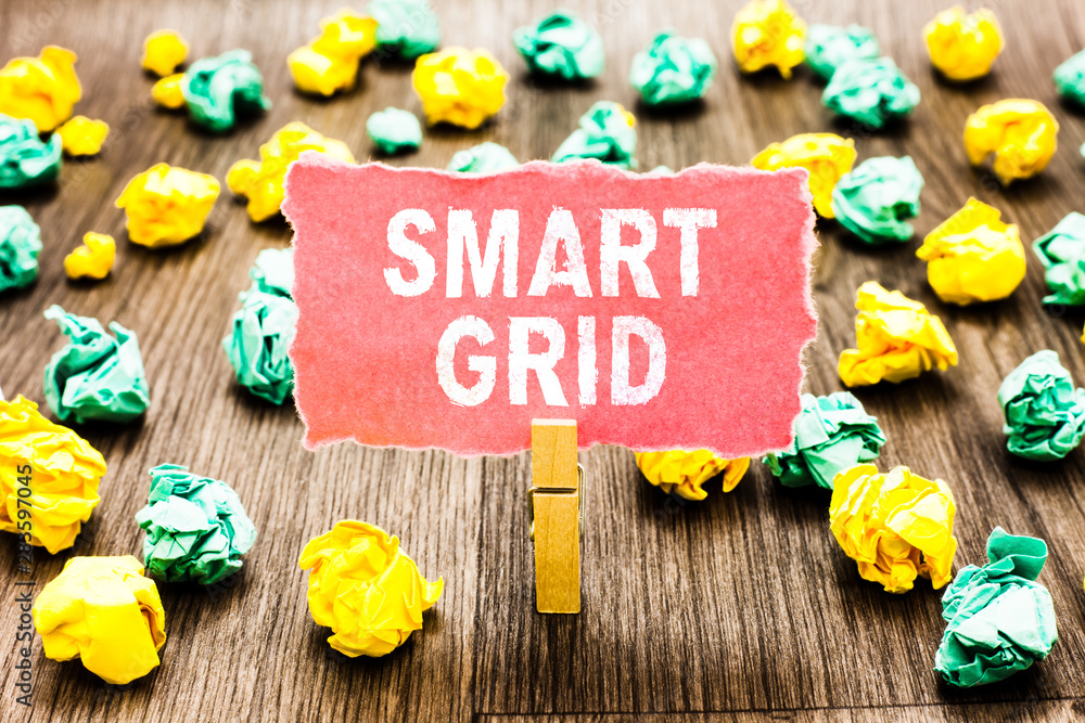 Word writing text Smart Grid. Business concept for includes of operational and energy measures including meters Clothespin holding pink note paper crumpled papers several tries mistakes