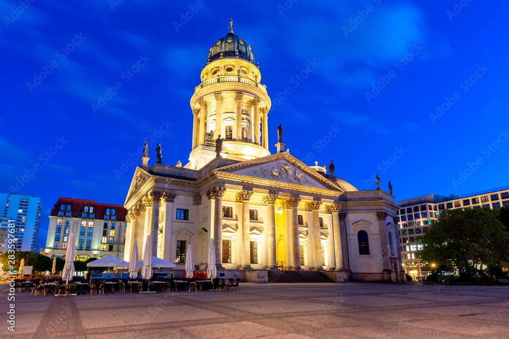 New Church (Deutscher Dom or Neue Kirche) on Gendarmenmarkt square at night, Berlin, Germany 
