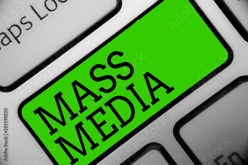 Text sign showing Mass Media. Conceptual photo Group people making news to the public of what is happening Keyboard green key Intention create computer computing reflection document