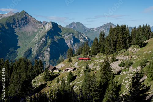 red historic railway in the swiss alps, schynige platte photo