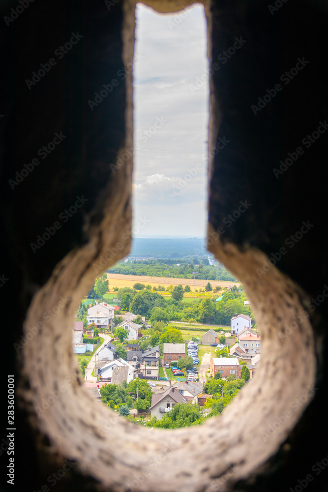 Fototapeta premium View through a window, key form