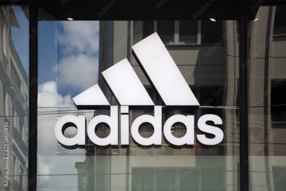 Detail of Adidas store in Istanbul, Turkey. Adi Dassler makes his first  sport shoes in his workshop near Nuremberg in Germany. Stock Photo | Adobe  Stock