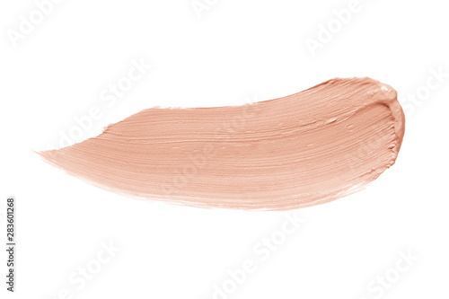 Concealer, corrector brush stroke. Nude color correcting cream smudge smear swatch sample. Makeup foundation creamy texture