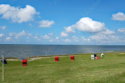 Friedrichkoog Strandkörbe am Deich photo