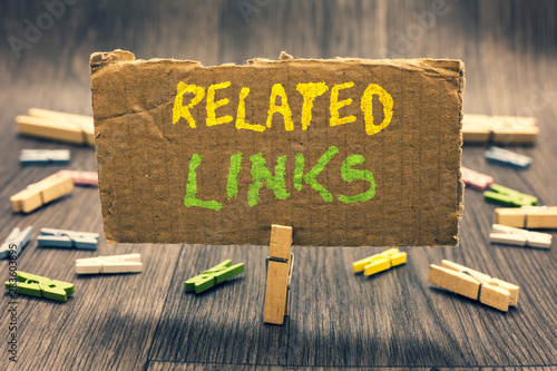 Writing note showing Related Links. Business photo showcasing Website inside a Webpage Cross reference Hotlinks Hyperlinks Clothespin holding paperboard important communicating message ideas