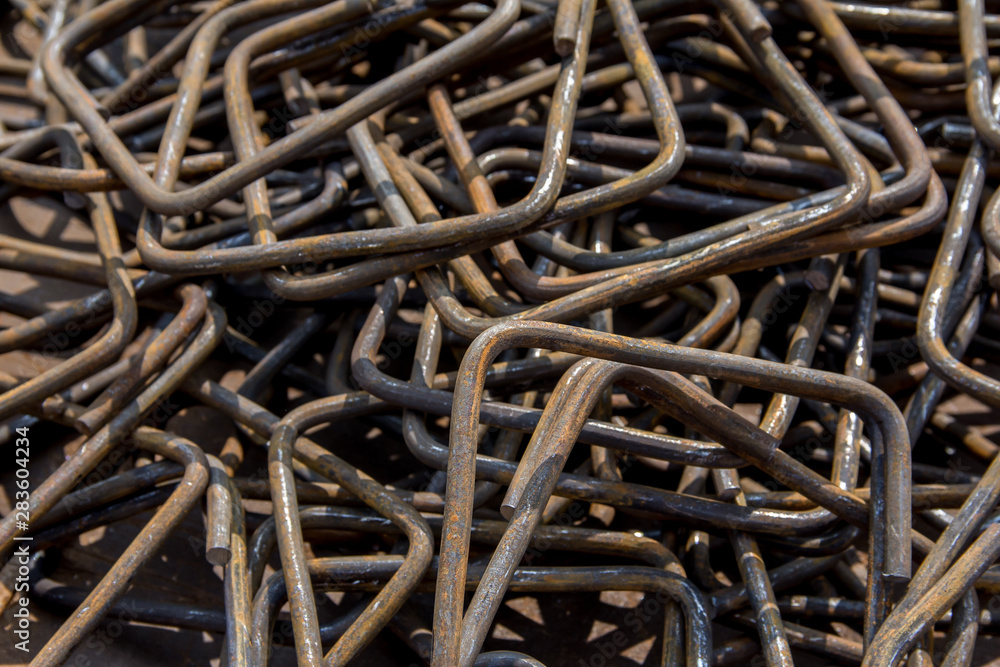 Industrial background. Rebar texture. Rusty rebar for concrete pouring. Steel reinforcement bars. Construction rebar steel work reinforcement. Closeup of Steel rebars. Industrial background. Rebar texture. Rusty rebar for concrete pouring. Steel reinforcement bars. Construction rebar steel work reinforcement. Closeup of Steel rebars.