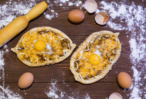 dish top view cooking khachapuri po adzharski photo