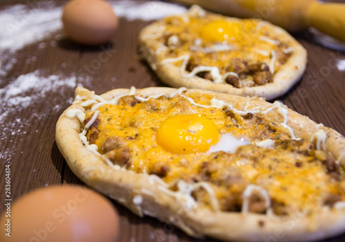 dish top view cooking khachapuri po adzharski photo