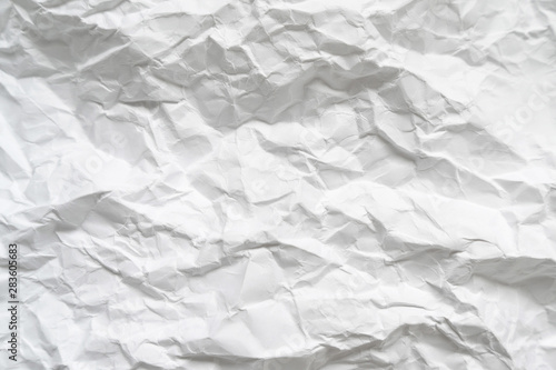 Background from a sheet of crumpled white paper.