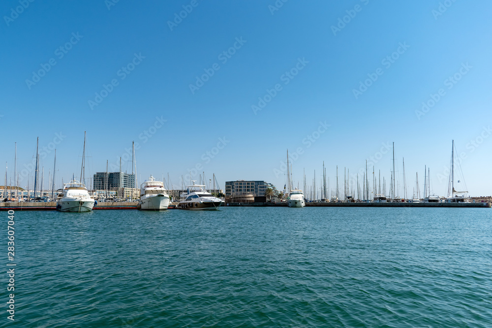 Sailboat harbor, many beautiful moored sail yachts in the sea port
