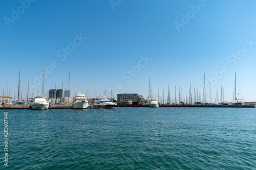 Sailboat harbor, many beautiful moored sail yachts in the sea port © Oxana Savca