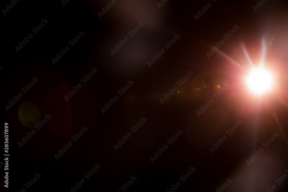 Abstract Natural Sun flare on the black background. Abstract Natural Sun flare on the black background.