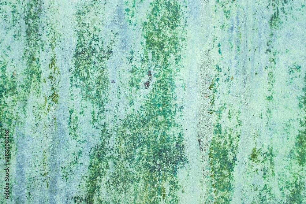 Fototapeta premium Green grunge painted wall surface worn weathered dirty old rough vintage background surface texture