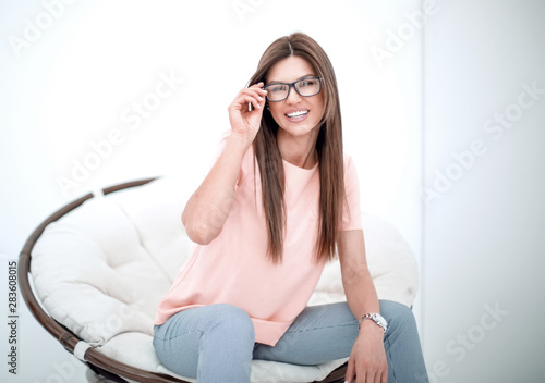 close up.modern business woman sitting in a comfortable chair