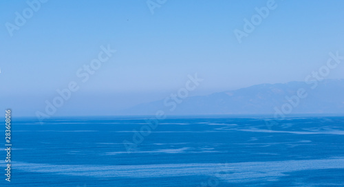 Foggy sea and blue sky