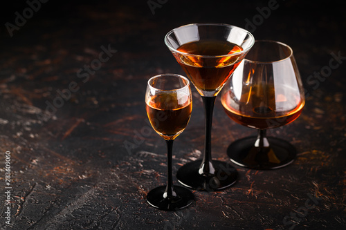 Set of strong alcoholic drinks in glasses