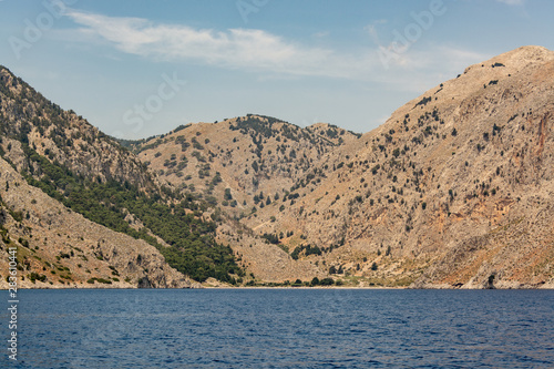 Boat trip along the shore of the island of Symi