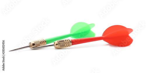 Sharp red and green darts isolated on white