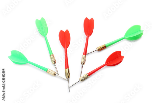 Sharp red and green darts isolated on white