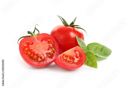 Carta da parati Fresh cherry tomatoes with basil isolated on white