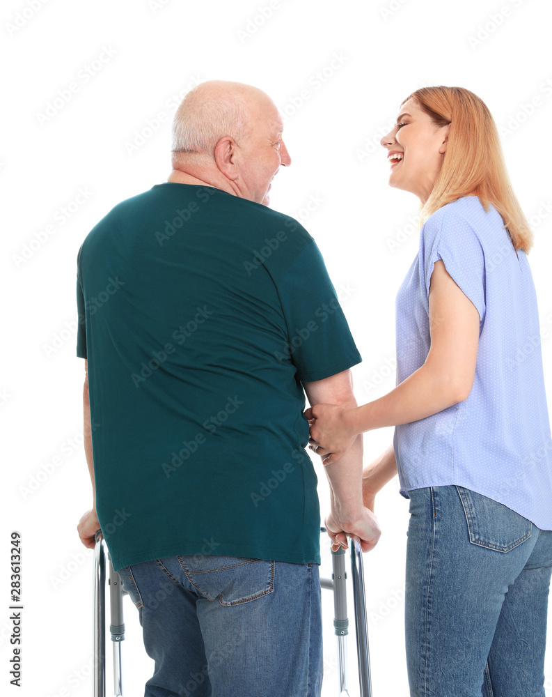 Caretaker helping elderly man with walking frame on white background Caretaker helping elderly man with walking frame on white background