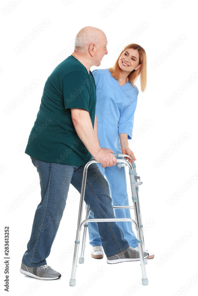 Caretaker helping elderly man with walking frame on white background Caretaker helping elderly man with walking frame on white background