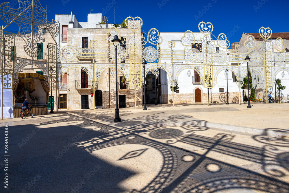 Obraz premium Piazza Umberto I or Umberto I Square beautiful decoration for La Festa di San Rocco, Saint Roch's Feast in Noicattaro, Apulia, Italy