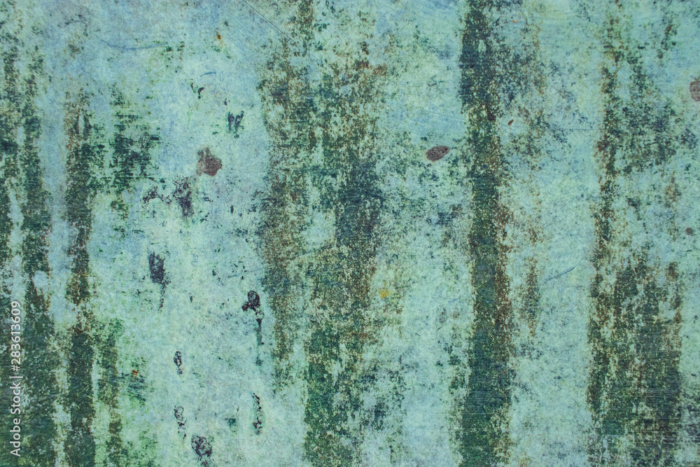 Green grunge painted wall surface worn weathered dirty old rough vintage background surface texture Green grunge painted wall surface worn weathered dirty old rough vintage background surface texture
