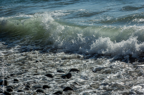 waves breaking on the rocks