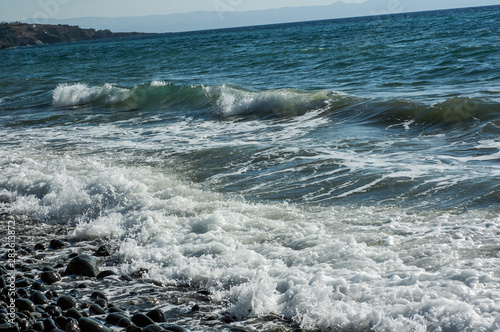 waves breaking on beach