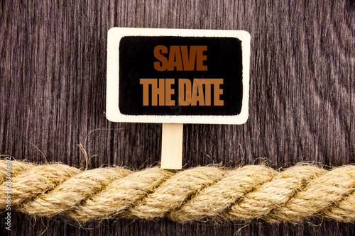 Conceptual writing text showing Save The Date. Business photo showcasing Wedding Anniversary Invitation Reminder written Blackboard Hanging rope wooden background