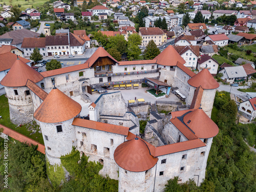 The castle Žužemberk ( Zuzemberk, Seisenburg, Sosenberch) is positioned on the terrace above the Krka River Canyon, Central Slovenia. photo