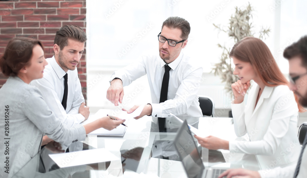 business team discussing business documents business team discussing business documents