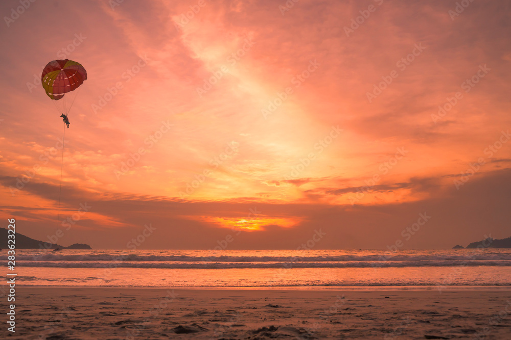 Sunset lovers, bright orange sky, on the beach Famous Phuket Patong Thailand Sunset lovers, bright orange sky, on the beach Famous Phuket Patong Thailand