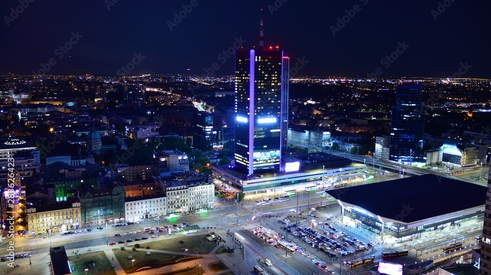 Fototapeta premium Modern office building at night. Night lights, city office building downtown, cityscape view 