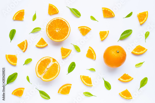 High vitamin C, Juicy and sweet. Fresh orange fruit with green leaves on white.