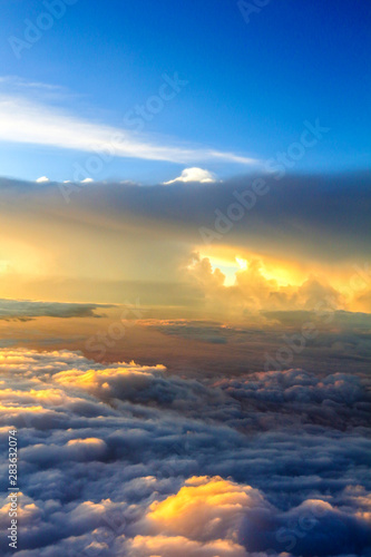 Spectacular sky scene with clouds with bright sunlight in the background