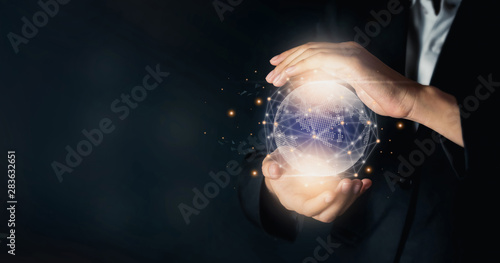 Business woman holding modern circle global network for worldwide international connection, Technology iot (Internet of think).