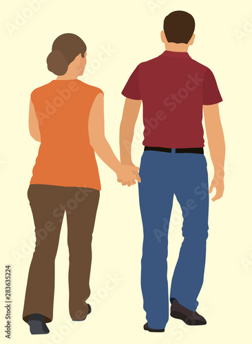 Young Couple Walking Away Holding hands