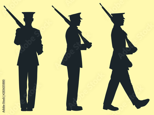 Silhouette of Soldier in the Military Holding Rifle