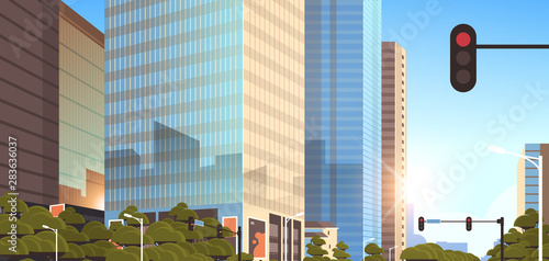 beautifil city street with traffic light skyline high skyscrapers modern cityscape sunrise background flat horizontal closeup