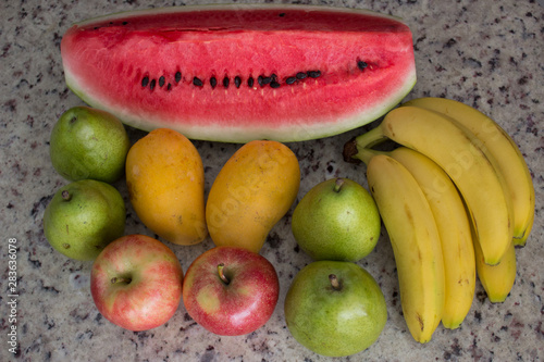 Watermelon, apple, bananas and pears