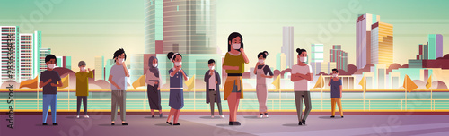 people wearing face masks environmental industrial smog dust toxic air pollution and virus protection concept mix race men women walking outdoor cityscape background full length horizontal