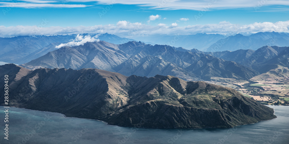 Mountain lake landscape top view from roys peak hike in Wanaka, New Zealand