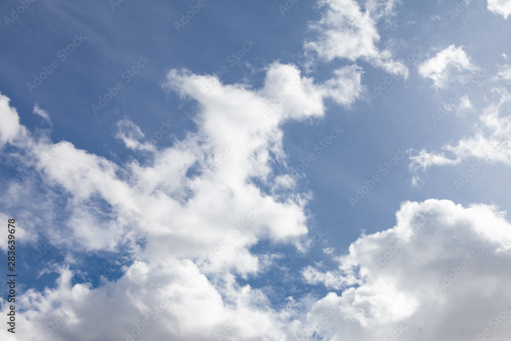 Blue sky background with clouds. Blue sky background with clouds.