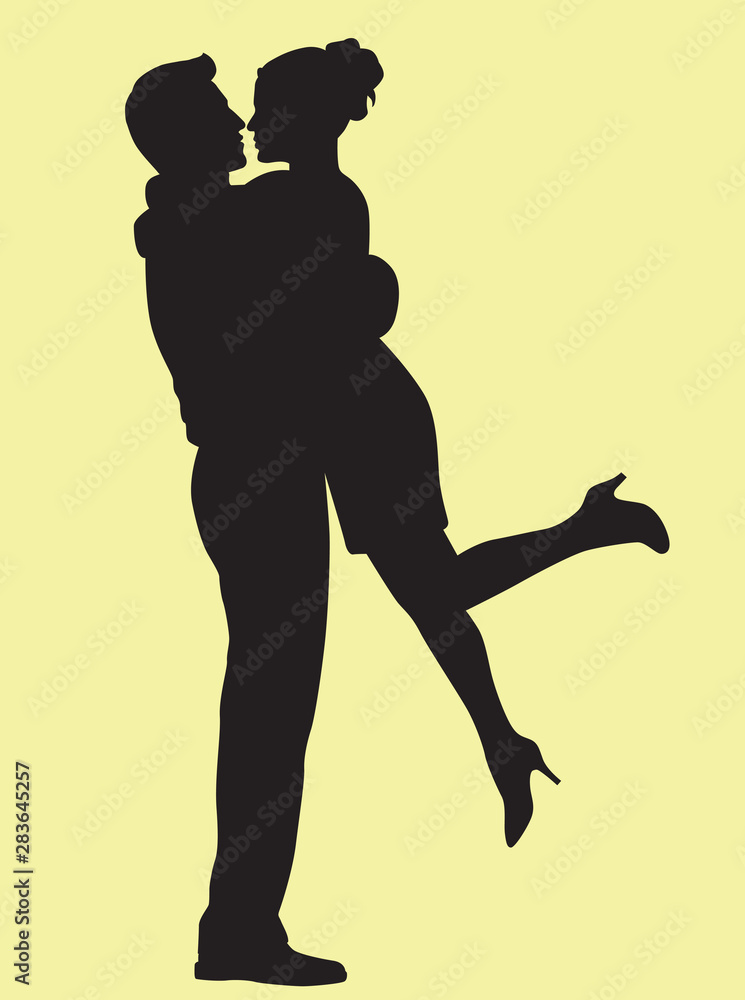 Couple Embracing While Man Picks up the Woman