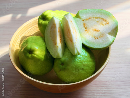 group of guava fruit with sliced on white photo