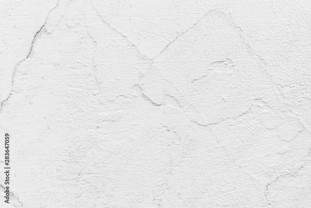 Fototapeta premium Texture of a concrete wall with cracks and scratches which can be used as a background