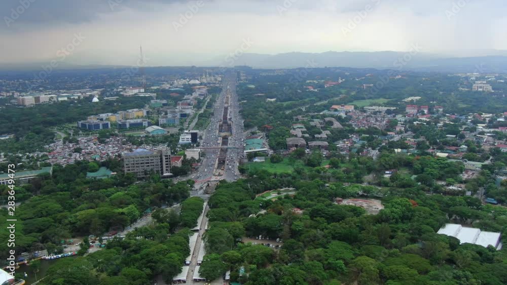 Nice wide overview outlook of the huge City of Quezon City and the mini forest area of Quezon Memorial Circle. Nice wide overview outlook of the huge City of Quezon City and the mini forest area of Quezon Memorial Circle.